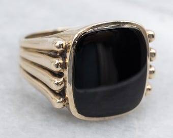 Anillo vintage de oro amarillo de 10 quilates con ónix negro