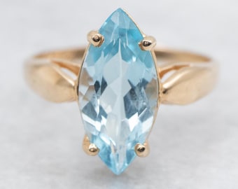 14K Yellow Gold Marquise Blue Topaz Solitaire Ring