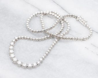 14K White Gold Graduated Diamond Tennis Necklace, 4.15 Carats