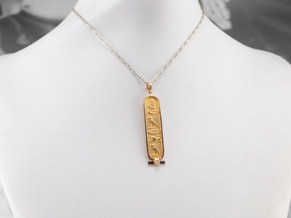 Gold hieroglyphics best sale necklace