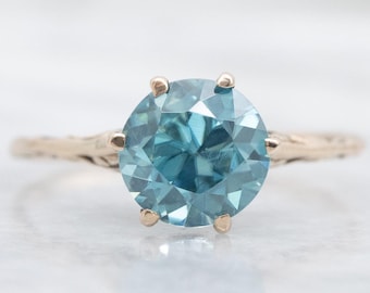 Anillo solitario antiguo de circonita azul con seis puntas