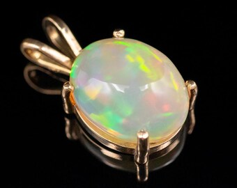 14K Yellow Gold Oval Opal Solitaire Pendant, 6.15 Carats
