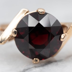 Anello bypass in oro giallo 14 carati con granato, solitario da 4,83 carati