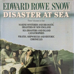 May include: A vintage book cover with a torn edge, featuring a painting of a group of men in a boat with a shark in the water. The title of the book is "Edward Rowe Snow Disaster at Sea" and the subtitle is "Three Volumes in One".