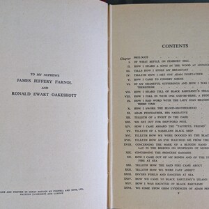 May include: Open book with the title page on the left and the table of contents on the right. The title page reads "TO MY NEPHEWS" and lists the authors. The table of contents lists chapters and page numbers.