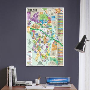 May include: A detailed map of Aliso Viejo, California, showing the city's neighborhoods, streets, and parks. The map is printed in color and includes a legend.