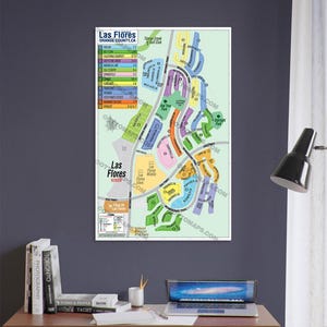 May include: A map of Las Flores, California, showing the different neighborhoods and streets. The map is in a colorful style with different colors for each neighborhood. The map also includes a key with the names of the neighborhoods and their corresponding colors.