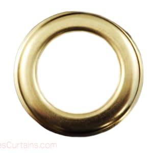 May include: A gold metal grommet with a smooth, shiny finish. The grommet is round and has a hole in the center.