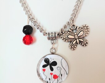 Collier cabochon fantaisie papillon et coquelicots