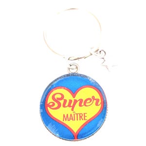 Superleuke cabochon sleutelhanger in de vorm van een juf, een leuk cadeau-idee voor het einde van het schooljaar. Roestvrij staal.