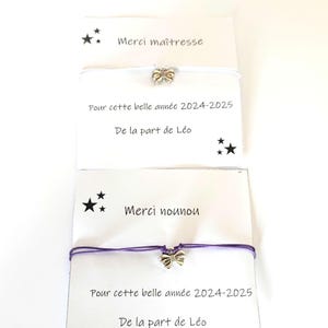 Bracelet fantaisie pendentif noeud et carte merci maîtresse, nounou, atsem. idée cadeau fin d'année scolaire.acier inoxydable.