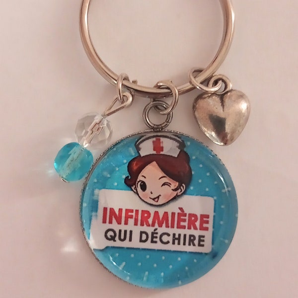 Porte clefs cabochon infirmière qui déchire