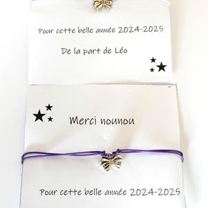 Bracelet fantaisie pendentif noeud et carte merci maîtresse, nounou, atsem. idée cadeau fin d'année scolaire.acier inoxydable.