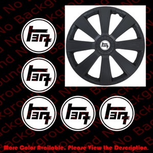 May include: Four black and white circular stickers with the Toyota logo. The stickers are on a black background. There is a black wheel cover with eight spokes in the center of the image.
