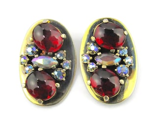 Schiaparelli Oval Cocktail Earrings/Ruby Red Glass Cabochons/AB Vitrail Navettes & Chatons/ Gold Tone Clip ons/ Faux Black Patina Highlights