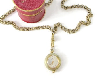 Bucherer 20mm Florentine Watch/17 Jewel Movement/Champagne Dial/30" Necklace