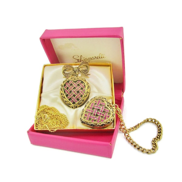 Schiaparelli Heart Lockets/Shocking Solid Creme Parfum/Hot Pink Rhinestones/Gold tone Bracelet Necklace Bow Brooch/Black Patina Highlights
