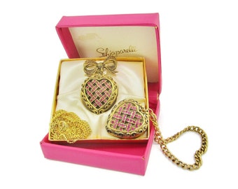 Schiaparelli Heart Lockets/Shocking Solid Creme Parfum/Hot Pink Rhinestones/Gold tone Bracelet Necklace Bow Brooch/Black Patina Highlights