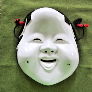 Large Okame Mask/Smiling Maid for Japanese Noh Play /Hand Painted Arita Porcelain/Happy Asian Theater Wall Art/Black hair - Red Bow Ribbons