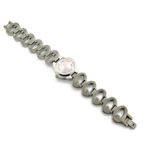 May include: A silver watch with a round face and a linked band made of interlocking ovals.
