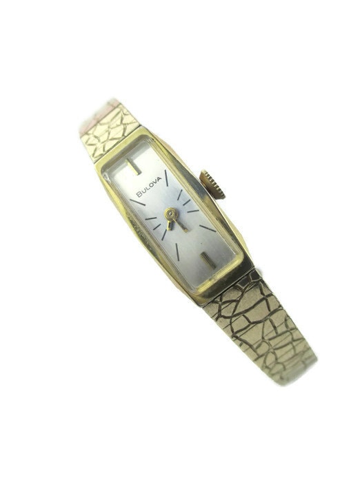 Montre Bulova Vintage Femme T3 - Mouvement Quartz, Boîtier Acier Argenté, Bracelet Doré Années 90