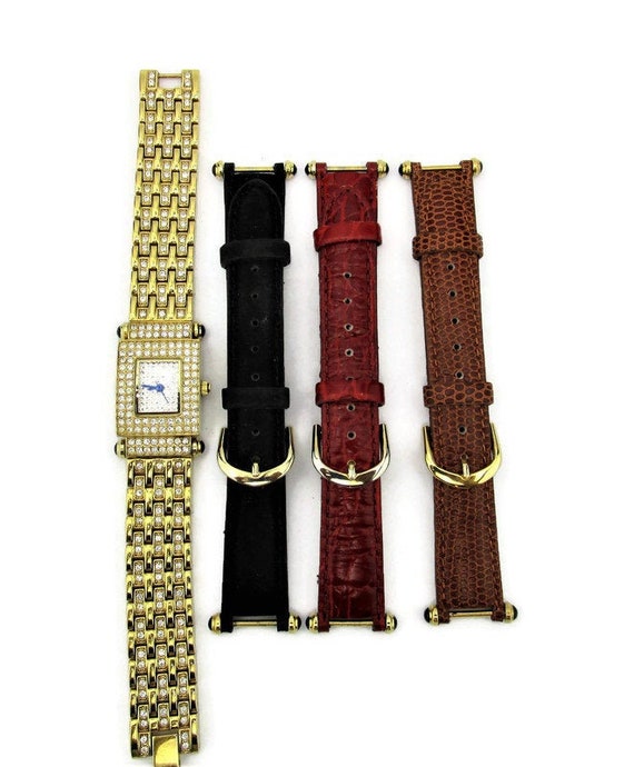 Real Collectibles by Adrienne Gold Watch /4 Changable Bands 