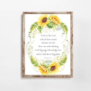 May include: A printable wall art design featuring a watercolor illustration of sunflowers and greenery in a wreath shape. The design includes the bible verse "Trust in the Lord with all thine heart: and lean not unto thine own understanding. In all thy ways acknowledge him, and he shall direct thy paths." Proverbs 3:5-6.
