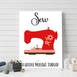 May include: A red and white polka dot sewing machine with a floral design. The text "Sew A Needle Pulling Thread" is below the image.