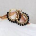 Tiny onyx hoops , small gemstone hoop earrings , small gold hoops , small wire wrapped hoops , black gemstone earrings , onyx earrings , uk
