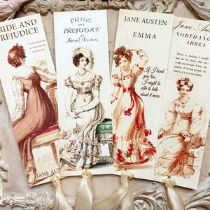 May include: Four vintage bookmarks with illustrations of women in period dress. The bookmarks feature titles such as "Pride and Prejudice" and "Emma" by Jane Austen, with quotes and decorative details.