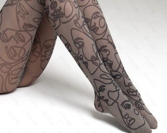 May include: Sheer taupe tights featuring a continuous black line art pattern of abstract faces. The design covers the entire surface of the hosiery. The text "virivee TIGHTS" is visible at the top, and "virivee • Girls' kiss tights" is at the bottom.