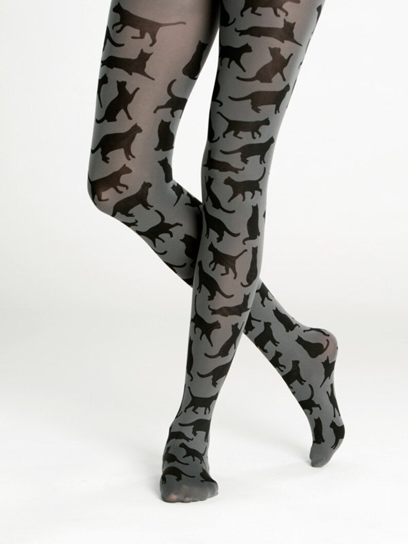 May include: Gray tights with a black cat print pattern.