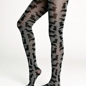 May include: Gray tights with a black dachshund silhouette pattern.