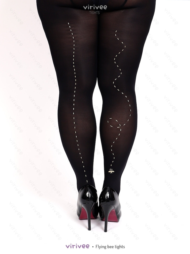 May include: Opaque black tights featuring a small gold bee graphic near the ankle. A white dashed line traces a straight path up the left leg and a winding, looping flight path up the right leg, ending at the bee. The text virivee appears at the top.