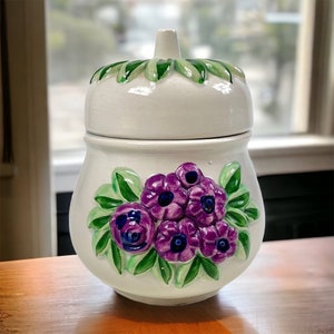 Vintage designer jar Rosa Ljung ceramic lidded container Swedish vintage, retro Scandinavian design floral purple flowers green leafs 1970s.