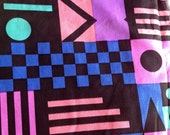 60s modern fabric with fantastic geometric pattern and bright colors. Great condition.
