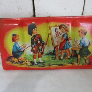 Adorable Child's Paint Set, Marked Made in Scotland, Pictured Children outside painting, two boys dressed in Kilts, oh so cute. image 1