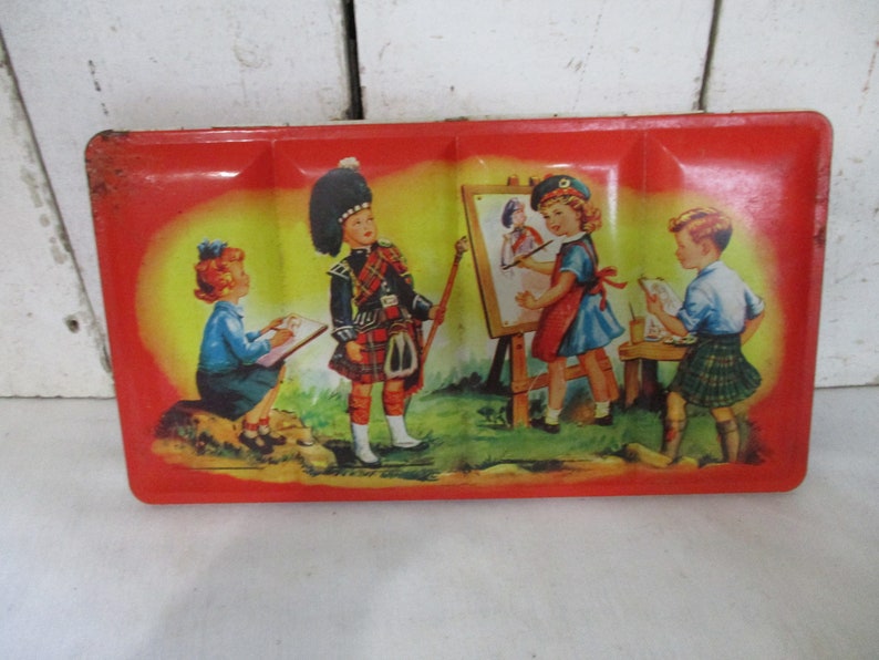 Adorable Child's Paint Set, Marked Made in Scotland, Pictured Children outside painting, two boys dressed in Kilts, oh so cute. image 1