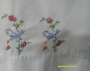 Extra Large Single Pillowcase.Two Little Blue Birds.Hand Embroidered. White Single Pillowcase. Measures 40 inches long and 21 inches wide.