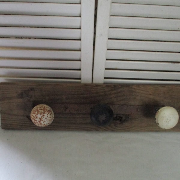 Salvaged Metal Door Knobs Rusty Metal Mounted on Piece of Wood. Three Metal Door Knobs, Can be used as a Coat Rack.