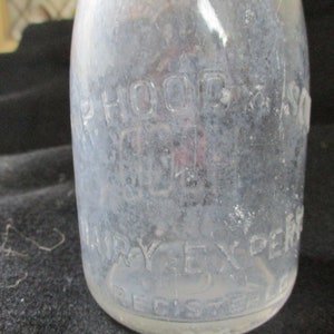 Embossed H.P. Hood & Sons, Dairy Experts. Uncommon half pint Maine 48 seal pint milk bottle. On the bottom is has Hood 1935. image 3