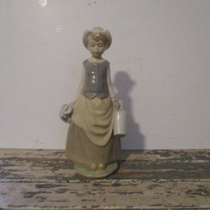 Beautiful Figurene, Lladro Girl with milk jars, jugs, 1970 Porcelain Figurene