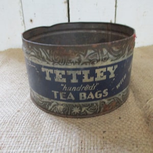 Old Tetley Tea Bags Metal Tin, Orange Pekoe and Pokoe Cut Black Tea. Tetley Tea Bags with Tags. Great Graphics.