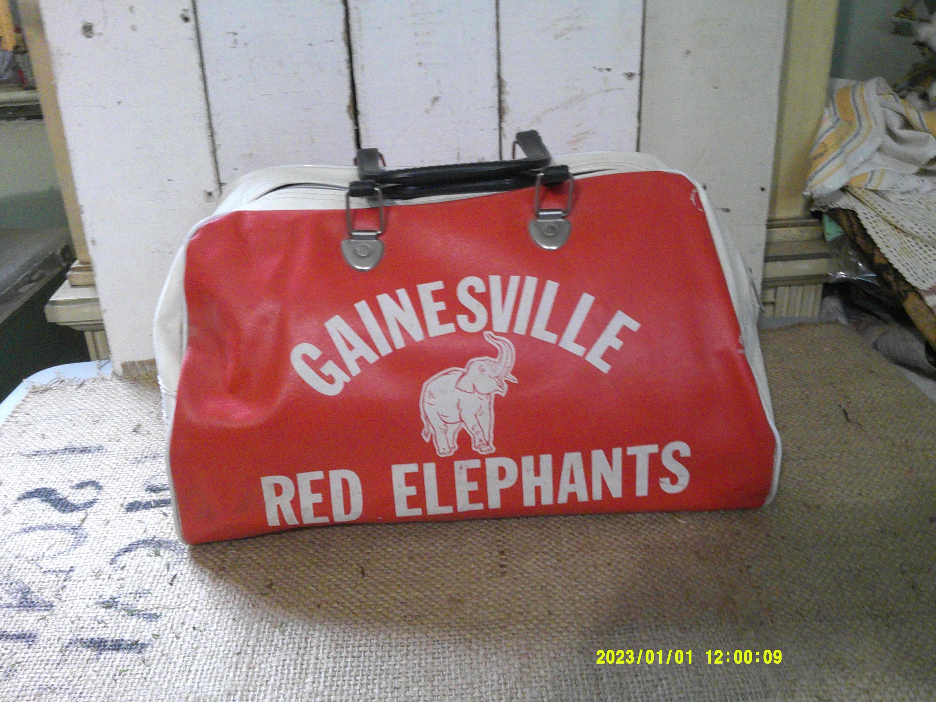 1960 Gym Bag, Gainesville Red Elephants, Red and White. Wording on