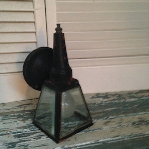 Single Black Iron Porch Fixture, 3 Sides have Clear Beveled Glass Working Condition