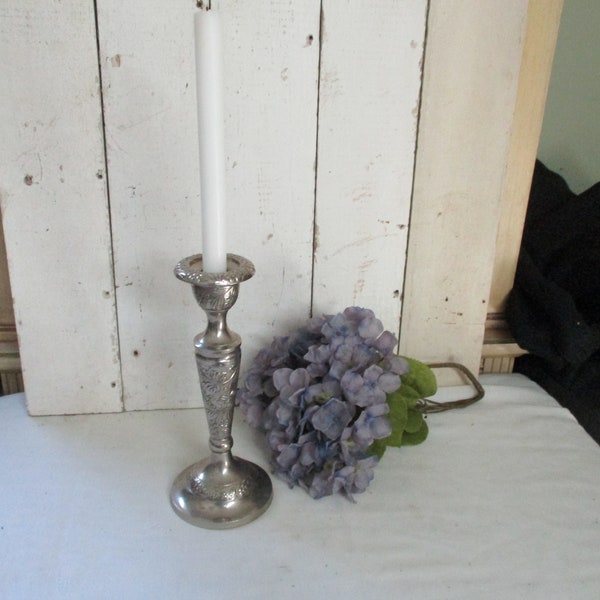 Oh So Elegant Silver Candlestick, Stands 10" tall, Beautiful flower designs all around.