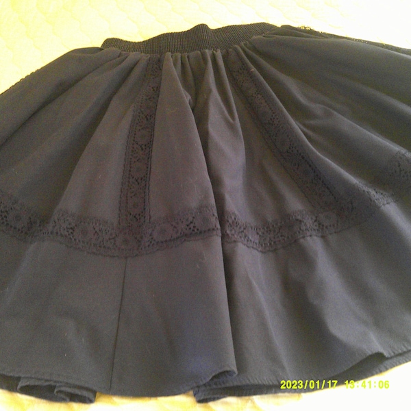 Nice Black Square Dance Skirt. Size Petite, Made by Malco Modes of San Francisco. Electric waist Band, Full with Panels divided by Lace.