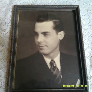 Need a Distinguished Relative? Or how about a Silver Toned Art Deco Picture Frame, 8 x 10 Wood Frame with Glass.