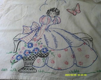 Beautiful Little Hand Stitched Apron. Embroidered Southern Belle with flower basket and butterfly. This little apron was hand hemmed.