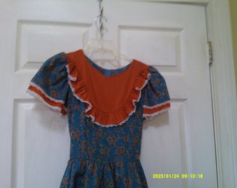 Pretty Square Dance Dress, Made by Rockmount Ranch Wear Denver Colo. Size 8, Burnt Orange with a Paisley Print Overlay, Zipper in back.